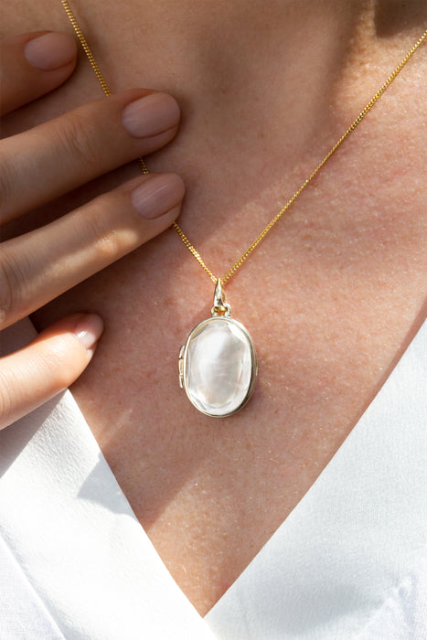 Gold Plated Sterling Silver Oval Mother Of Pearl & Clear Quartz Locket Necklace